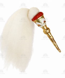 Ornate white ostrich feather attached to a gold decorative quill pen with red accents, shown close up