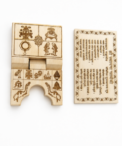 Wooden puzzle block toy: grid of carved symbols and animals, plus an ornate instruction sheet nearby.