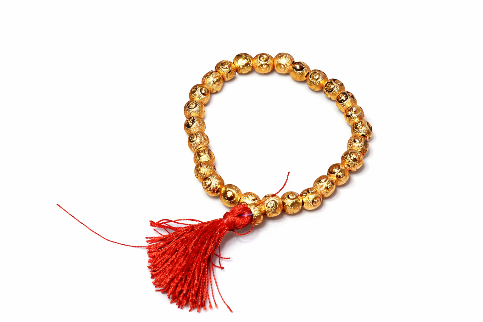 Beads Navkarwali Mala Gold beaded bracelet with a red tassel hanging from it on a white background