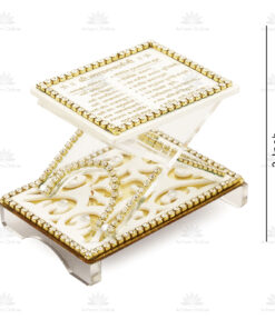 Ornate miniature Hindu mandir (temple) with gold-beaded borders and a Sanskrit inscribed top plaque.