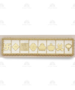 Gold charm bracelet on a beige display board, with a row of gold symbols (swastika, lotus, geometric patterns, urns) framed by a gem-studded border.