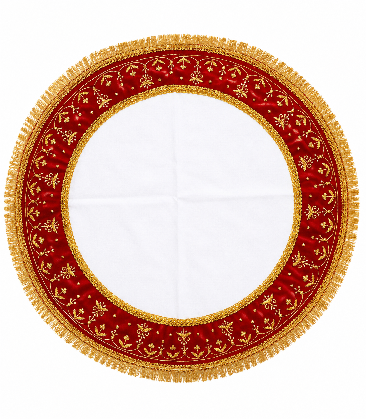 Circular decorative cloth with a red velvet border, gold embroidery and fringe surrounding a white center.