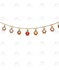Gold and white beaded necklace with red circular pendants featuring intricate gold medallions and small charms along the chain, laid across a white background with watermark patterns.