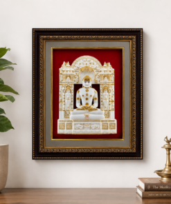 Ornate framed white statue of a seated deity with gold accents on a red background.