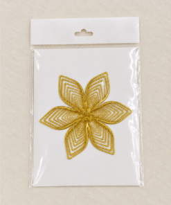 Gold embroidered five-petal flower patch in clear plastic packaging on a white backing.