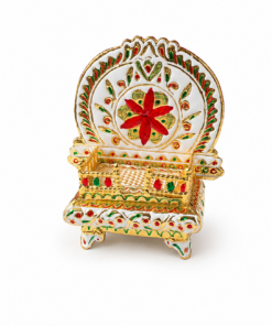 Colorful ornate decorative plate with a red flower motif on a gold stand
