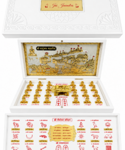 White ornate devotional keepsake box opened to reveal a gold temple diorama with many tiny statues and a bottom tray featuring red-script symbols and diagrams.