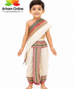 Smiling young boy in a cream and multicolor striped traditional outfit, standing barefoot against a white background with Arham Online logo in the upper left corner.