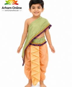 Smiling child wearing a green draped top with gold fringe and orange pleated pants, barefoot, standing against a white background (Arham Online logo top left).