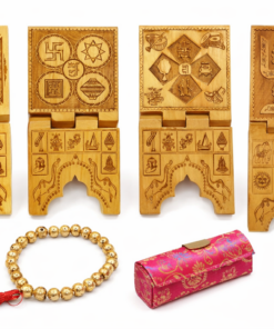 Four carved wooden fortune-telling boards with ornate patterns, plus a gold bead bracelet and a pink decorative case on a white background, as a collection of gifts or toys.